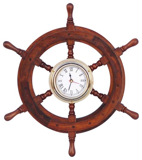 Put your seashell collection to good use as home decor. Wooden Ship Wheel Clock - Beach Style - Wall Clocks - by Handcrafted Nautical Decor