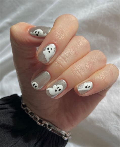 47 Cute And Spooky Halloween Nail Ideas 2022 Shimmery Grey Floaty Ghost