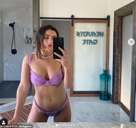 Charli Xcx Shows Off Her Figure In A Plunging Purple Bikini Daily