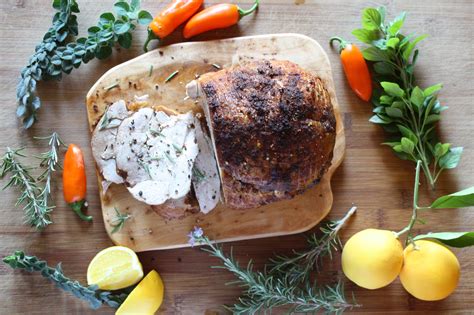 Herb crusted and stuffed with garlic it is a winner every time! Boneless Turkey Roast Recipe