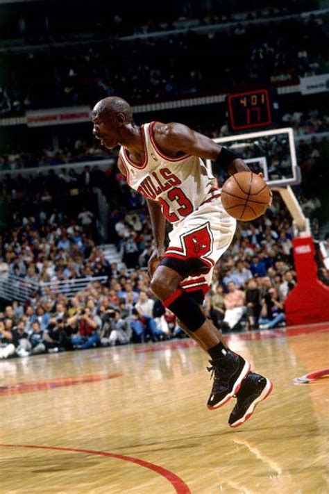 Michael Jordan Dribbles In The Jordan Xi Bred 30 Classic Pictures