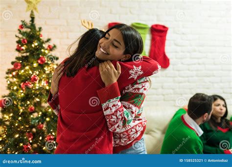 Loving Friends Embracing At Christmas Party Stock Image Image Of Friendship Holiday