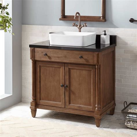 A shelf inside the vanity maximizes storage space, and the towel hooks are a nice touch. 36" Neeson Vessel Sink Vanity - Rustic Brown - Bathroom