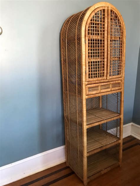 With a glass top, they're incredibly tough. Wicker Rattan Cabinet Shelf Unit by RavenPearVintage from ...