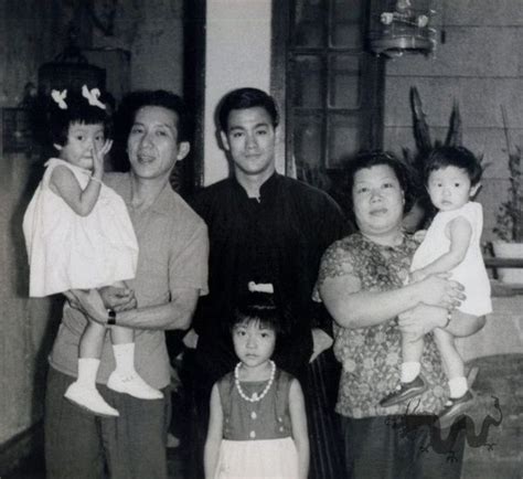 Lee grew up in an affluent family. Bruce with family at his home 218 Nathan road HongKong ...