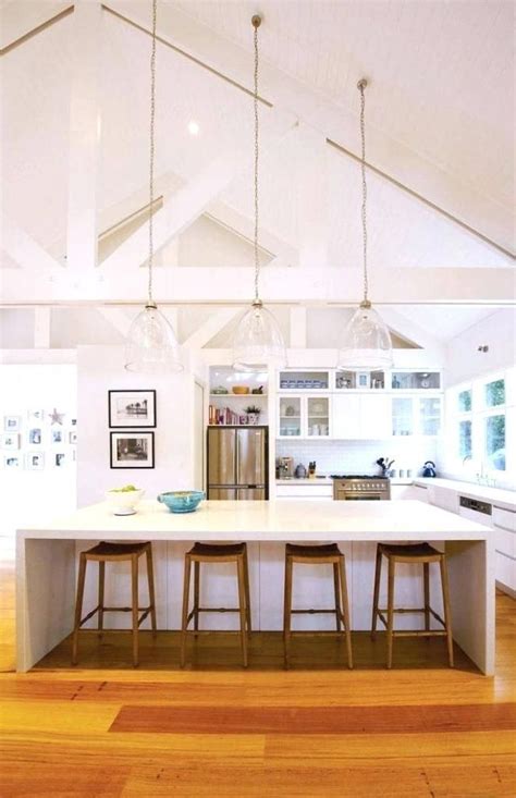 Once purchased or rented, people begin to realize that they can be dark and dreary if not on. Sloped Ceiling Lighting Ideas | Coastal kitchen design ...