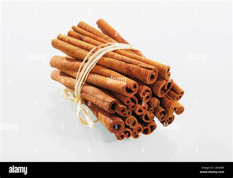 Bundle Of Cinnamon Sticks On White Background Stock Photo Alamy