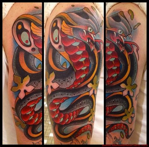Tattoo hình rắn hổ mang ở cánh tay. Hình xăm con rắn 2013 đẹp
