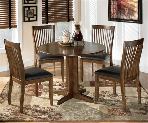 If you're searching for real handcrafted kitchen table and chairs, you can't go wrong with bassett furniture's benchmade line of dining furniture. Signature Design by Ashley Stuman 5-Piece Round Drop Leaf ...