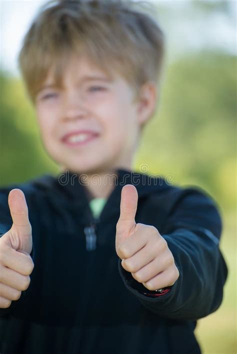 Kid Giving Two Thumbs Up Stock Photos Free And Royalty Free Stock