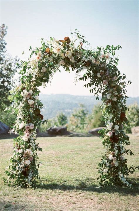27 Beautiful Floral Wedding Arches To Swoon Over Wedding Arch Floral