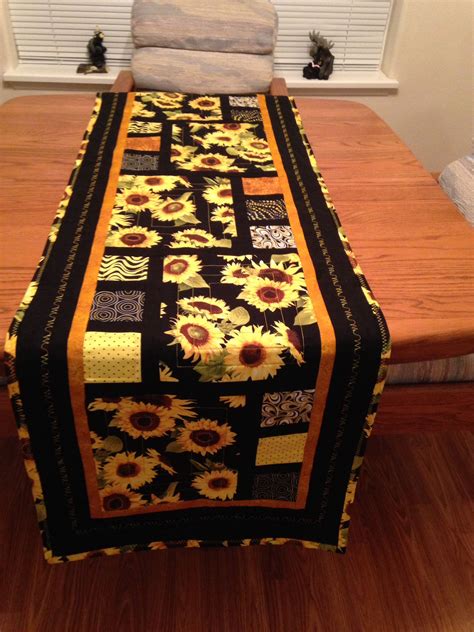 I just made this sunflower table runner for summer. Sunflower Table Runner, Divided by Three pattern just ...