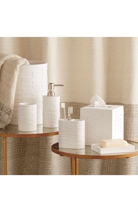 Don't live a cluttered life when you can tidy up with the cheerful home bathroom decor box. DKNY High Rise Tissue Box Cover | Tissue box covers, Chic ...