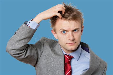 Portrait Of Confused Businessman Scratching Head Stock Image Image Of