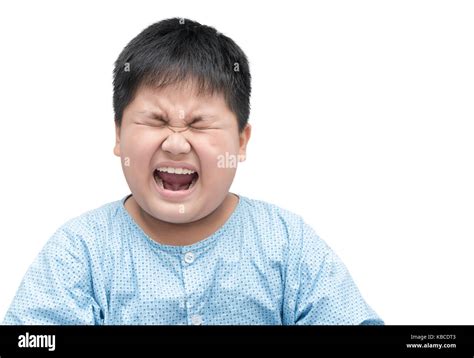 Portrait Of A Scared Obese Fat Boy Isolated On White Background