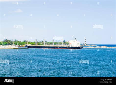 Cargo Boat Arriving At The Entrance Of The Port Of Santo Domingo