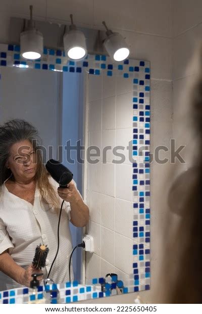 Mature Grayhaired Senior Woman Drying Her Stock Photo