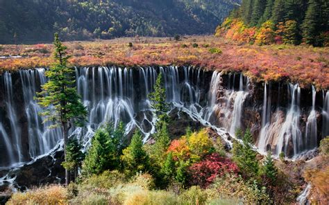 Jiuzhaigou Tibetan China Nuorilang Waterfall Is A Nature Reserve And