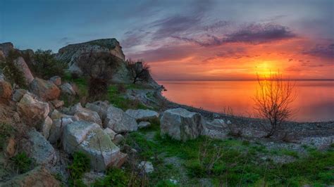 Sunset Red Sky And Lake Shore With Rock Hd Wallpaper