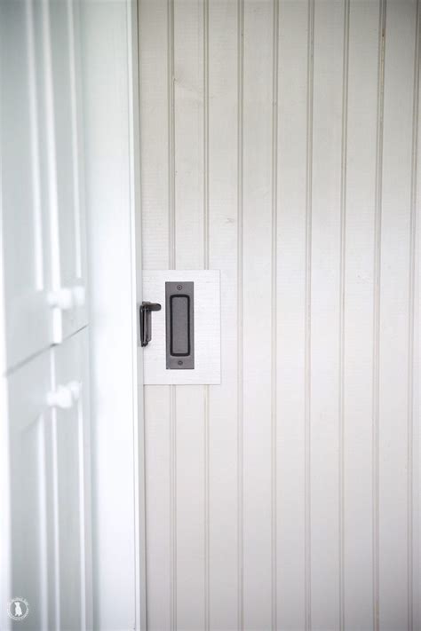 That means that a breeze won't cause slamming doors during the spring and summer. DIY Add A Lock To A Barn Door - The Handmade Home