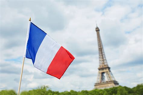 French National Flag In Paris With The Eiffel Tower Fotografie Stock