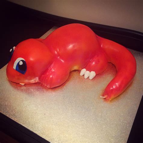 A Cake Shaped To Look Like An Animal Laying On Top Of A Counter With