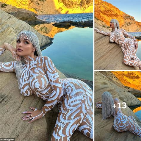 Demi Rose Showcases Provocative Photos Strikes Poses In White Body