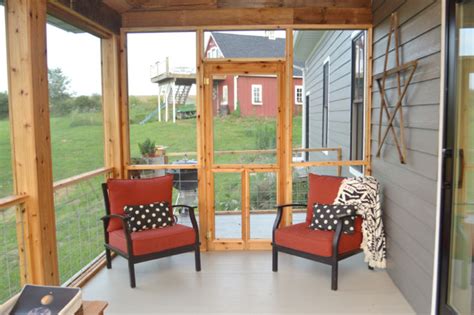 When we build porch ceilings with exposed rafters, the typical specifications are 2x 8 rafters, every two feet on center. DIY screened porch - NewlyWoodwards