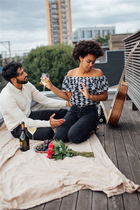 Couple Having A Date On The Rooftop · Free Stock Photo