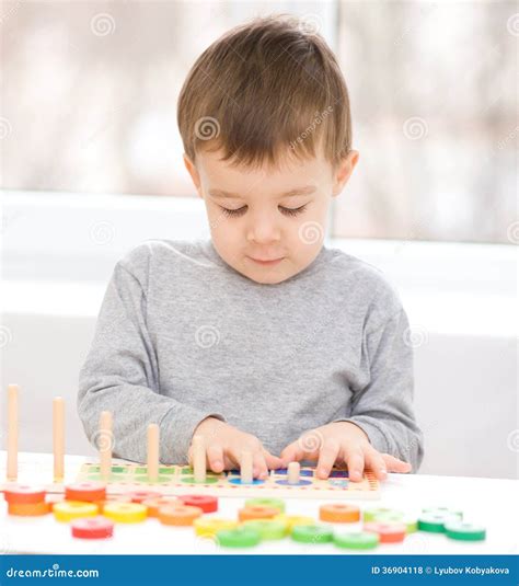 Boy Is Playing With Building Blocks Stock Photo Image Of Blocks