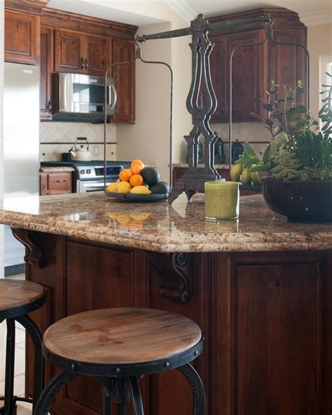 Finding a kitchen countertop that functions best for your household? Traditional Kitchen Island With Barstools and Granite ...