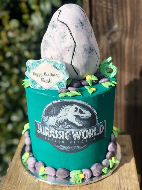 Jurassic Themed Cake With Cracking Egg On Top Wiz Khalifas Sons