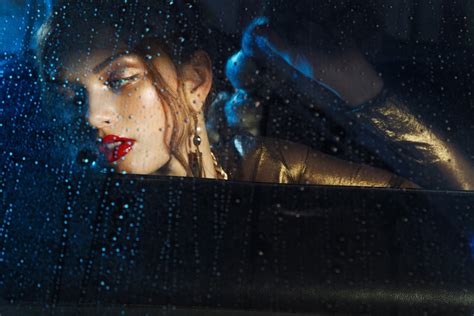 Woman In Car White Bentley Rainy Night Time Luxe Fashion