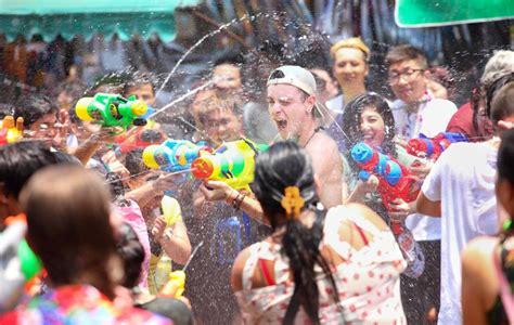Thailand New Year Songkran Splashes In With Water Fights And Raves