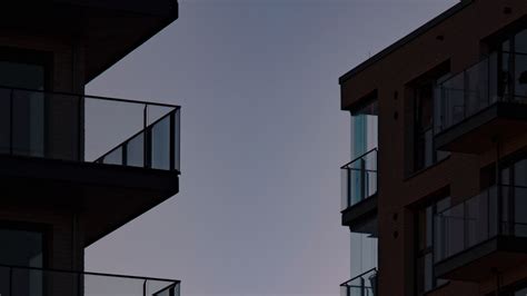 Download Wallpaper 1920x1080 Buildings Balconies Sunset Sky Full Hd