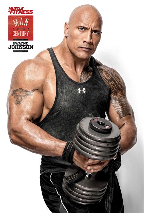 The Rock Is Holding Two Dumbs In His Hands