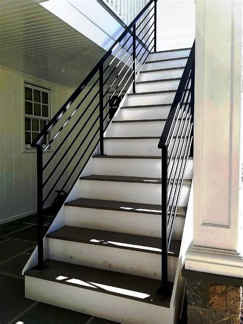 This classic handrail with vertical bars is going to be perfect for helping you . Pin on WROUGHT IRON RAILINGS