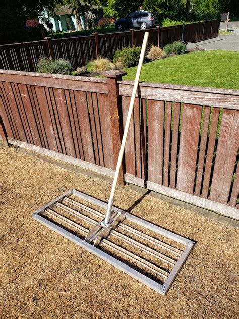 A lawn leveling rake helps the job be completed more quickly. Diy Lawn Leveling Rake