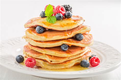 Closeup Of American Pancakes With Berries On White Background Fab