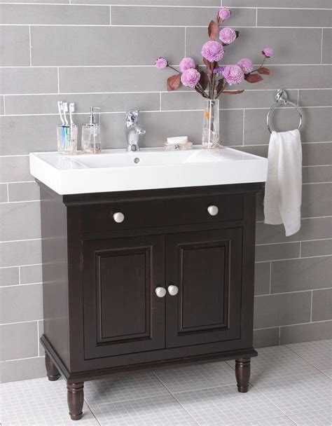 Give your bathroom a light and airy feel with this vanity with top from the ellenbee collection. Lovely Bathroom Cabinets Michigan