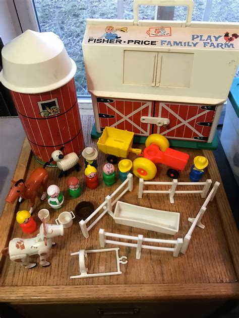 Development meets play with our interactive 'little people® caring for animals farm'. Vintage 1967 Fisher Price Barn, Silo, People, Farm Animals ...
