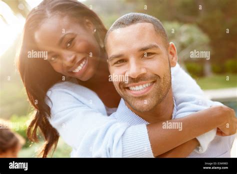 Portrait Of Loving African American Couple In Countryside Stock Photo