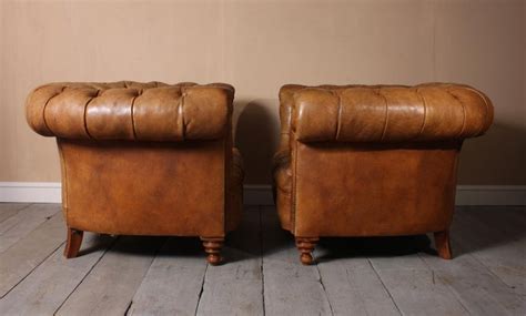Maybe you would like to learn more about one of these? Pair of Tan Leather Chesterfield Club Chairs at 1stdibs