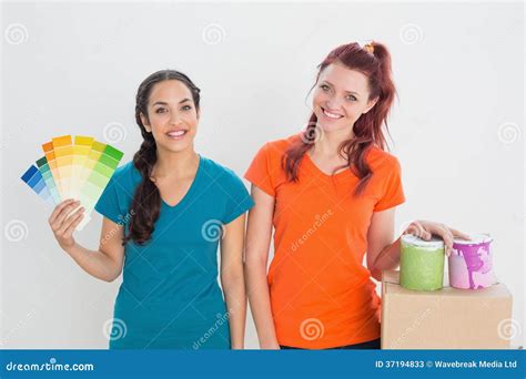 Friends Choosing Color For Painting A Room Stock Image Image Of Friendship Friends 37194833