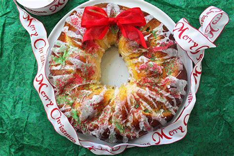 Braid together, stretching strips while braiding to keep even and uniform in length. Christmas Wreath Bread - Jenny Can Cook