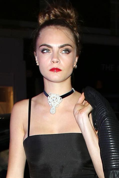 Cara delevingne is giving good lip. Cara Delevingne Has a Lip Ring Now -- The Cut