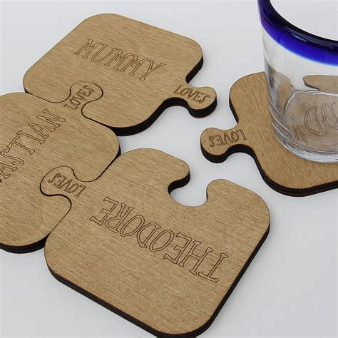 Four Personalised Wooden Jigsaw Coasters By Neltempo
