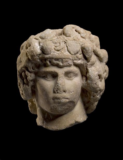 A Monumental Roman Marble Portrait Head Of Antinous As Dionysos Osiris
