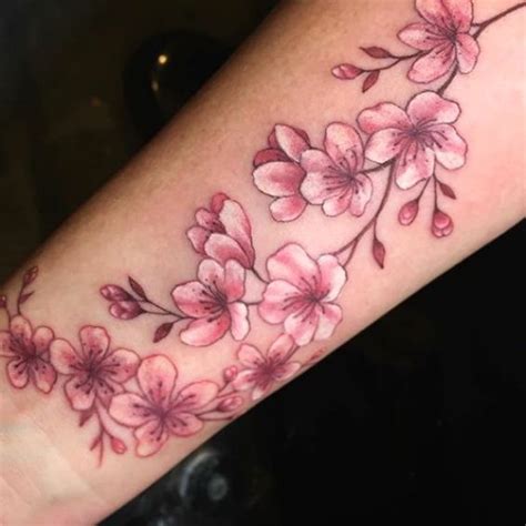 Cherry Blossom Tattoo Design In 2021 Flower Wrist Tattoos Cherry