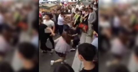 Shocking Moment Woman Is Beaten In Street In Front Of Massive Crowd